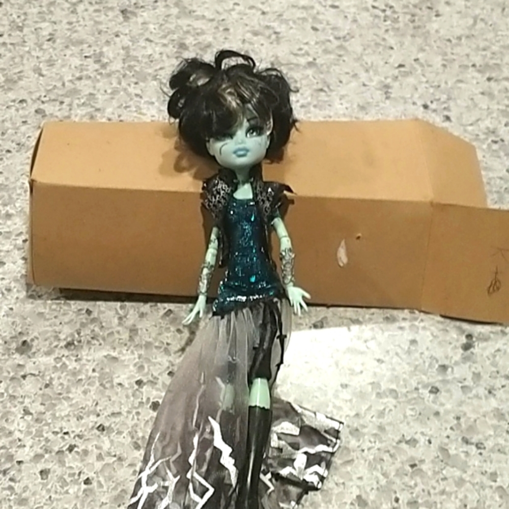 Green monster high doll,
